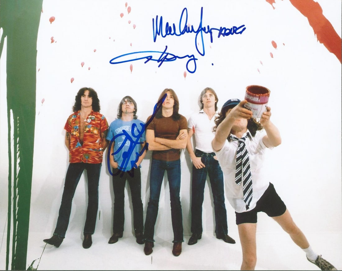 AC/DC Signed 8x10 Photo Angus Young Malcolm Young Cliff Williams BAS Authenticated: AC/DC Signed 8x10 Photo Angus Young Malcolm Young Cliff Williams BAS Authenticated This original 8x10 photograph features the autographs of Angus Young, Malcolm Young, and Cliff Williams, members of t