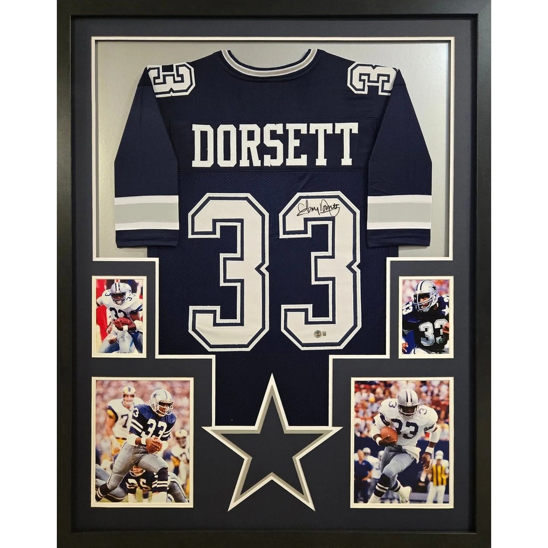 Framed Autographed Tony Dorsett Jersey Navy Beckett Authenticated Dallas Cowboys: Framed Autographed Tony Dorsett Jersey Navy Beckett Authenticated Dallas Cowboys This pre-owned framed jersey features an authentic autograph by Tony Dorsett. The jersey is professionally framed with
