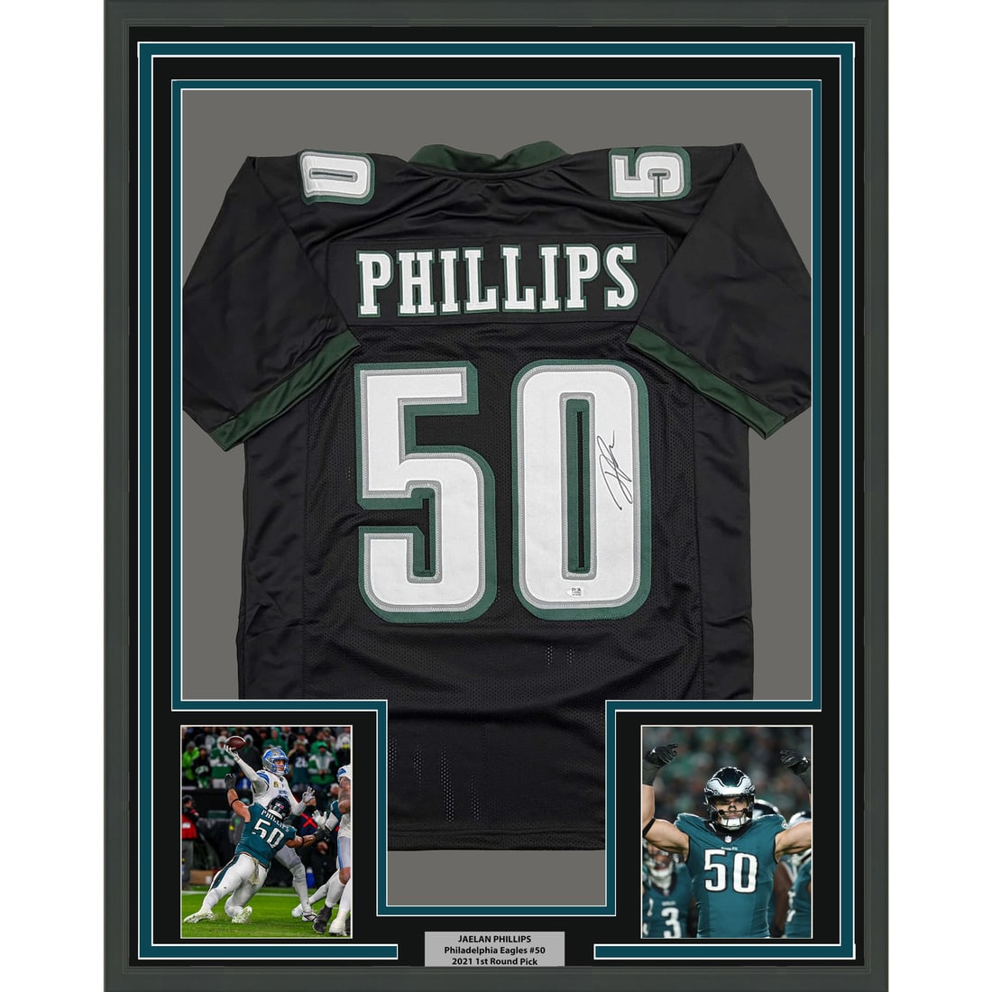 Jaelan Phillips Signed Philadelphia Eagles Black Jersey Framed 35x39 PSA Authenticated: Jaelan Phillips Signed Philadelphia Eagles Black Jersey Framed 35x39 PSA Authenticated This is a professionally framed and matted black Philadelphia Eagles jersey autographed by Jaelan Phillips. The d