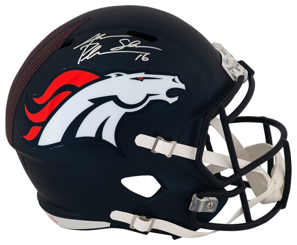 Jake Plummer Signed Denver Broncos Riddell Helmet with Snake Inscription: Jake Plummer Signed Denver Broncos Riddell Helmet with Snake Inscription This is a full-size Riddell replica helmet of the Denver Broncos, personally signed by Jake Plummer. The helmet features the in