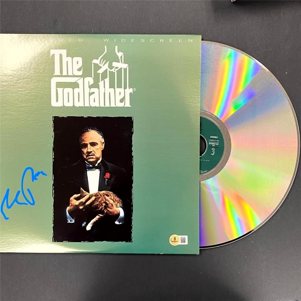 The Godfather LaserDisc Cover Hand Signed by Al Pacino Beckett Authenticated: The Godfather LaserDisc Cover Hand Signed by Al Pacino Beckett Authenticated This is an original LaserDisc cover for the movie The Godfather, autographed by Al Pacino. The signature has been authentic
