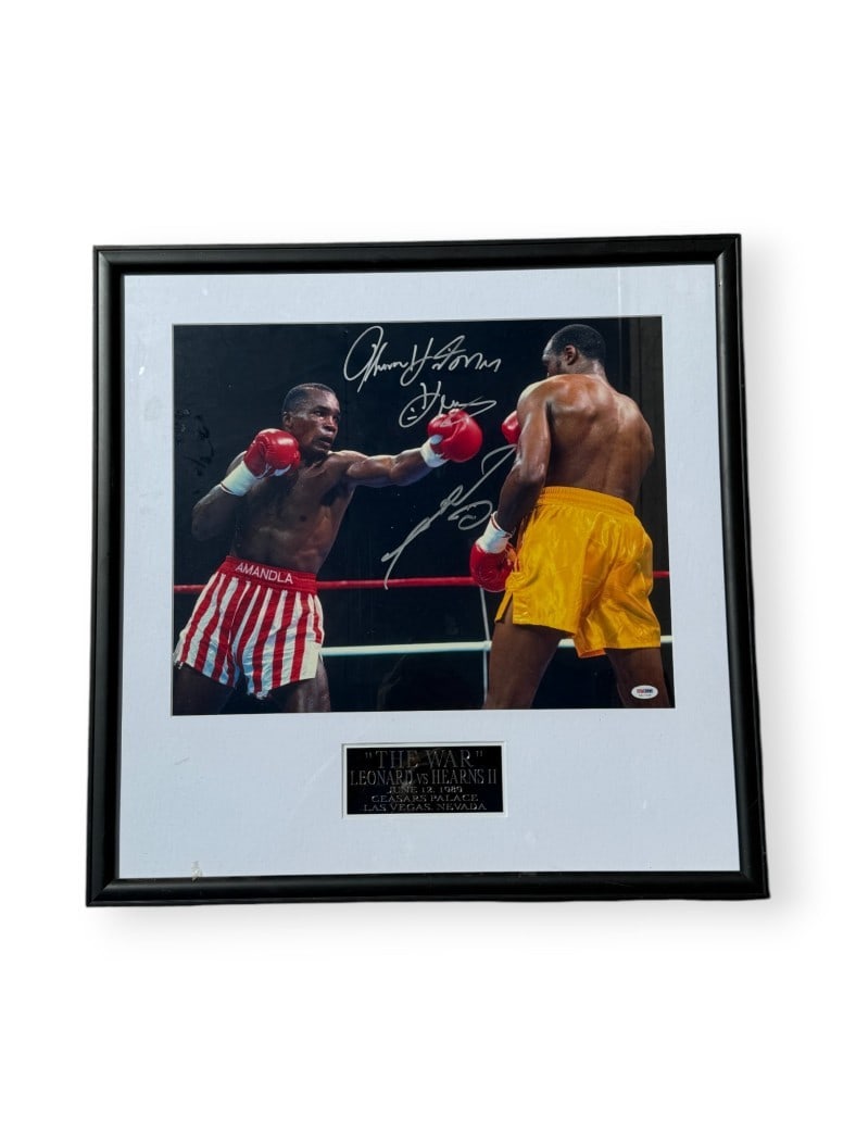 Sugar Ray Leonard Thomas Hearns Signed Framed 16x20 Photo PSA: Sugar Ray Leonard Thomas Hearns Signed Framed 16x20 Photo PSA This stunning autographed 16x20 photo captures the iconic boxing match between Sugar Ray Leonard and Thomas Hearns, famously known as "The