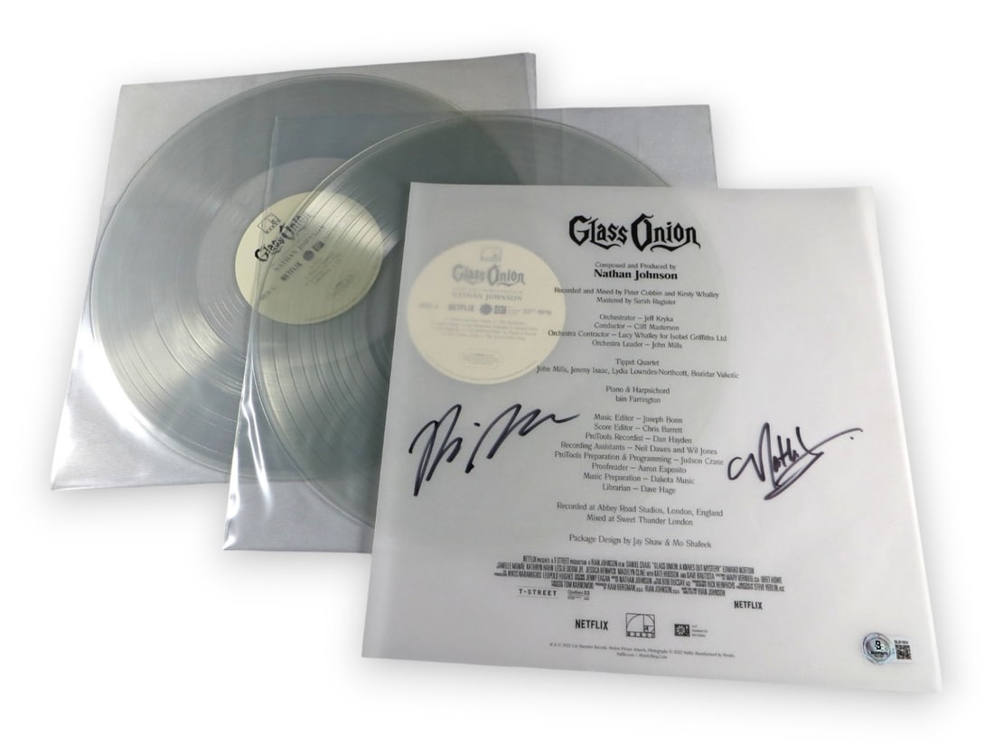 Autographed Glass Onion Album Cover Signed by Rian and Nathan Johnson BAS: Autographed Glass Onion Album Cover Signed by Rian and Nathan Johnson BAS This album cover has been autographed by Rian Johnson and Nathan Johnson. The item includes the original record(s), although t