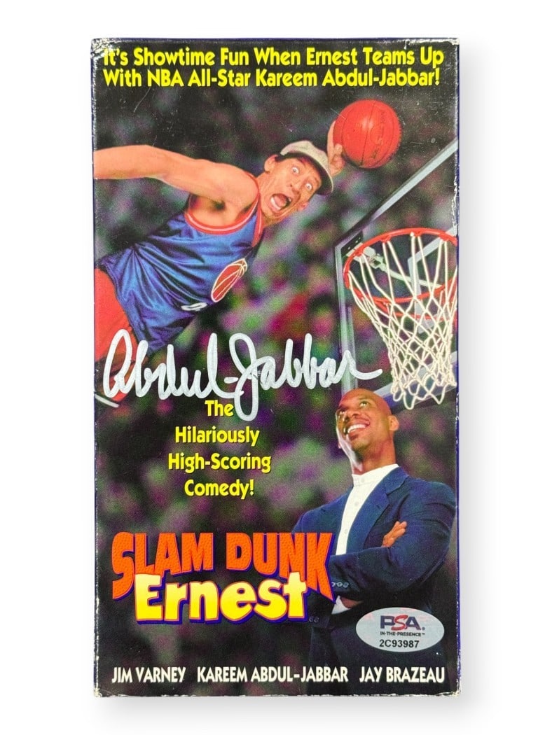 VHS Cover Autographed by Kareem Abdul-Jabbar with PSA Authentication Lakers: VHS Cover Autographed by Kareem Abdul-Jabbar with PSA Authentication Lakers This is an original VHS tape cover for "Slam Dunk Ernest" signed by Kareem Abdul-Jabbar. The autograph has been authenticate