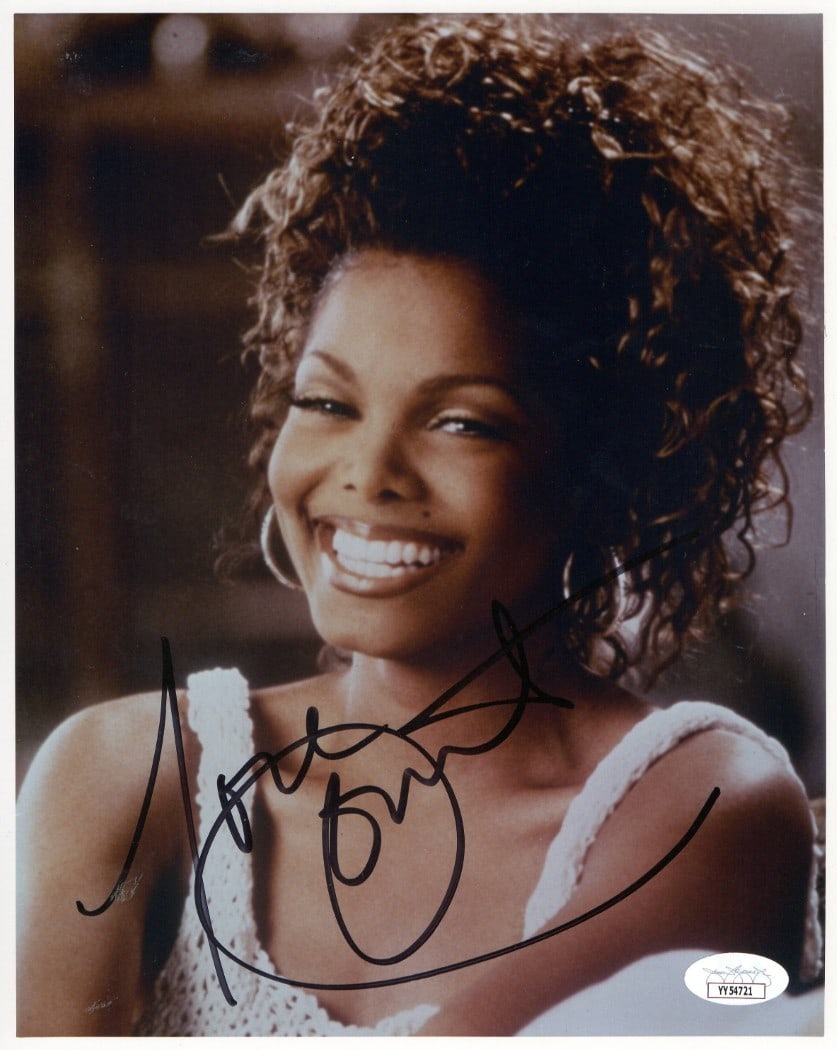 Janet Jackson Autographed 8x10 Photo Sexy Smile JSA Certified: Janet Jackson Autographed 8x10 Photo Sexy Smile JSA Certified This is an authentic 8x10 photograph of Janet Jackson, featuring her captivating smile while wearing a stylish knit top. The photograph