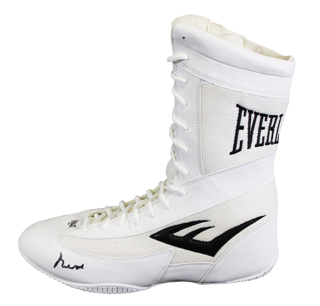 Everlast Boxing Shoe Size 13 Autographed by Muhammad Ali PSA DNA 10: Everlast Boxing Shoe Size 13 Autographed by Muhammad Ali PSA DNA 10 This white Everlast boxing shoe, size 13, has been personally signed by Muhammad Ali. The autograph has received a Gem Mint 10 grade