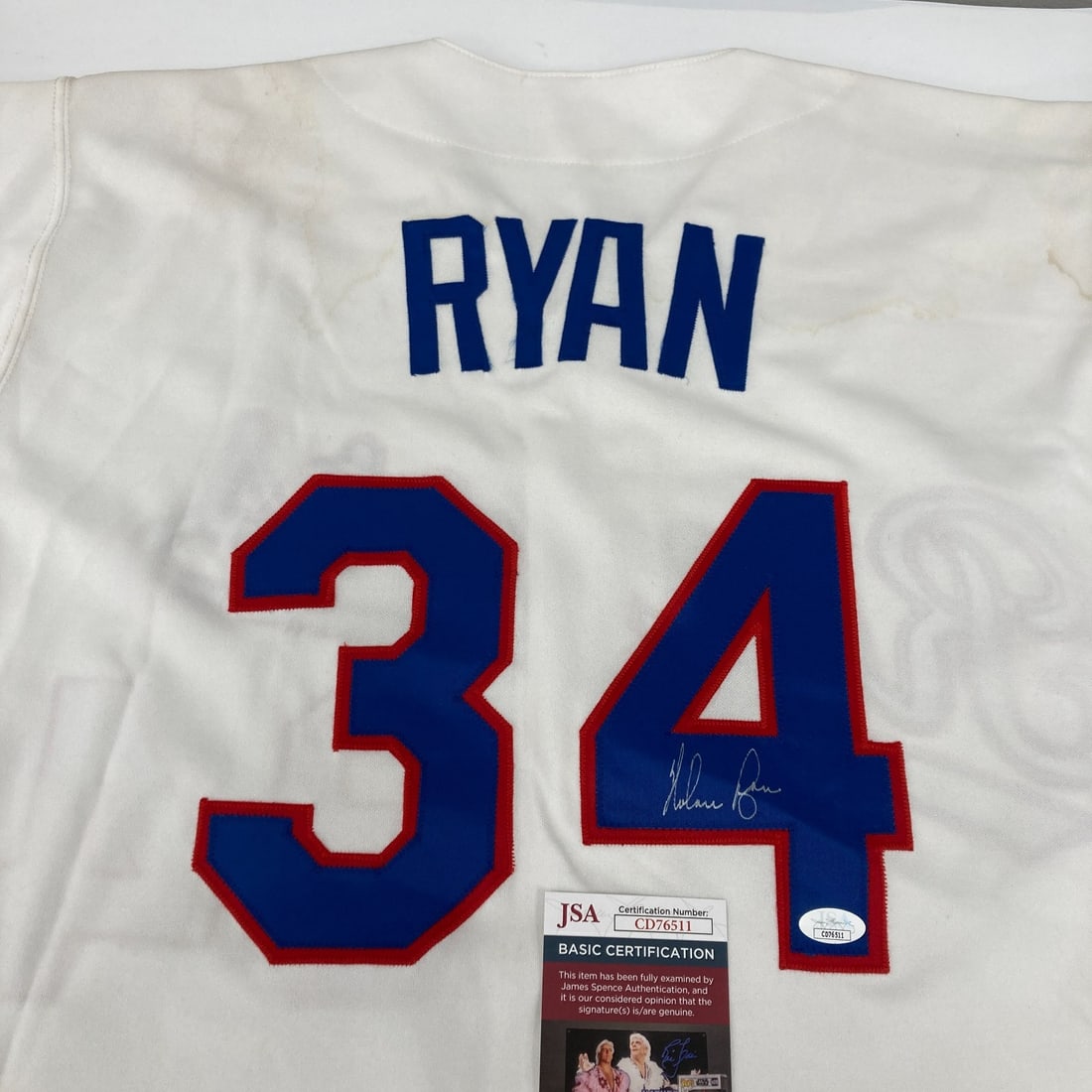 Nolan Ryan 1990s Texas Rangers Game Jersey with JSA Certification: Nolan Ryan 1990s Texas Rangers Game Jersey with JSA Certification Celebrate the legacy of baseball legend Nolan Ryan with this signed 1990's Russell Texas Rangers Game Model Jersey. This original jers