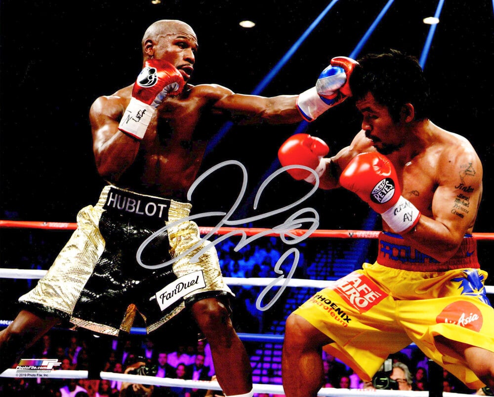 Floyd Mayweather Jr Signed 8x10 Photo vs Manny Pacquiao Certified: Floyd Mayweather Jr Signed 8x10 Photo vs Manny Pacquiao Certified Capture a piece of boxing history with this original 8x10 photo of Floyd Mayweather Jr. in action against Manny Pacquiao, personally s