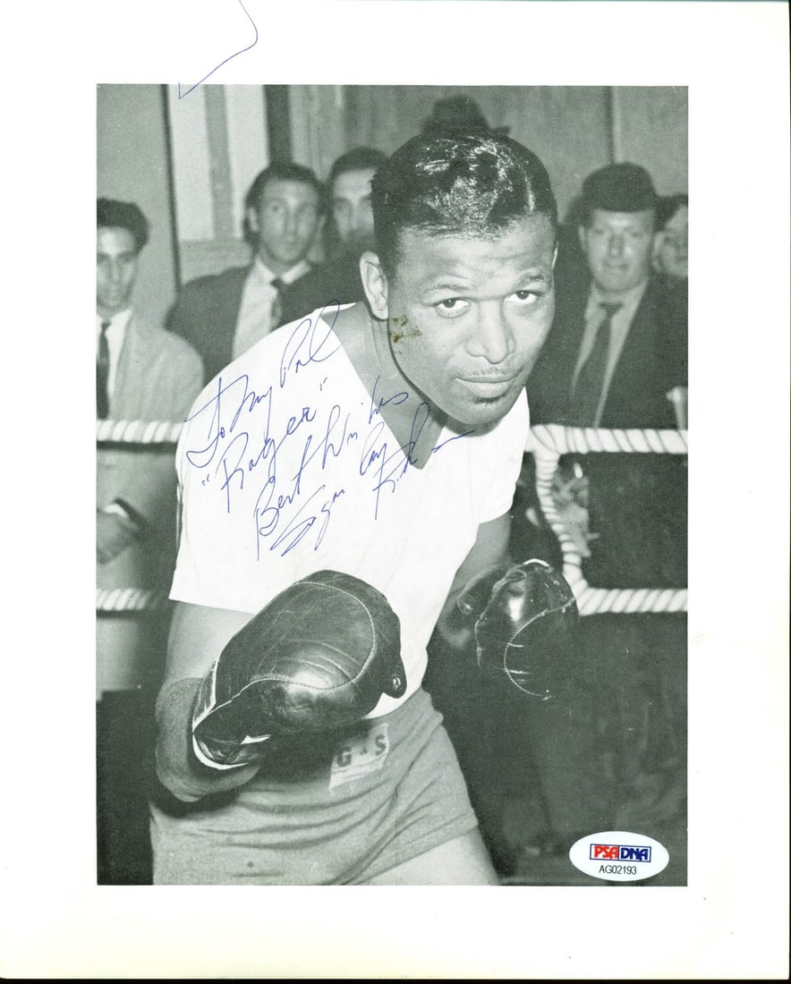 Sugar Ray Robinson Signed 8x10 B&W Photo with Inscription PSA Certified: Sugar Ray Robinson Signed 8x10 B&W Photo with Inscription PSA Certified This is an authentic signed black and white 8x10 photo of boxing legend Sugar Ray Robinson, featuring the heartfelt inscription