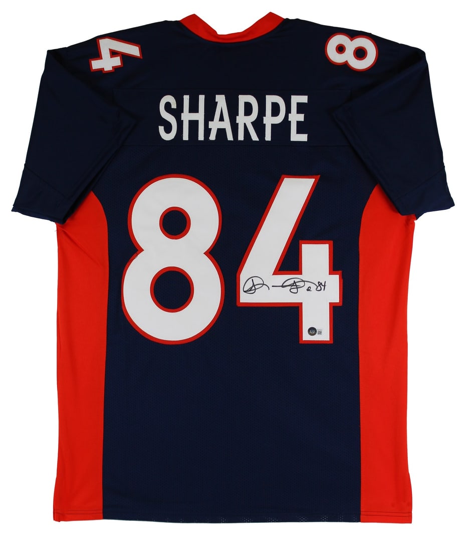 Shannon Sharpe Signed Navy Blue Pro Style Jersey Denver Broncos BAS Authenticated: Shannon Sharpe Signed Navy Blue Pro Style Jersey Denver Broncos BAS Authenticated This authentic navy blue pro style jersey has been personally signed by Shannon Sharpe, legendary tight end of the Den