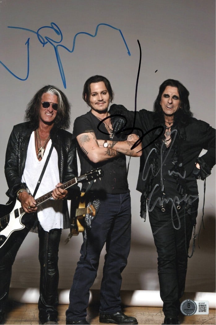 Johnny Depp Joe Perry Alice Cooper Signed 8x12 Photo Beckett Authentic: Johnny Depp Joe Perry Alice Cooper Signed 8x12 Photo Beckett Authentic This original 8x12 photograph features the autographs of three rock legends: Johnny Depp, Joe Perry, and Alice Cooper, who are