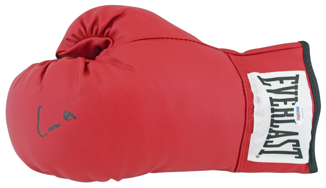 Muhammad Ali Signed Red Everlast Boxing Glove PSA Authenticated: Muhammad Ali Signed Red Everlast Boxing Glove PSA Authenticated This authentic red Everlast boxing glove has been personally signed by the legendary Muhammad Ali, originally known as Cassius Clay. A t