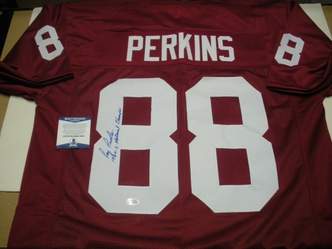 Beckett Certified Ray Perkins Alabama Signed 1964 1965 Championship Jersey: Beckett Certified Ray Perkins Alabama Signed 1964 1965 Championship Jersey This is a pre-owned Alabama Crimson Tide jersey, signed by Ray Perkins. The jersey commemorates the 1964/65 championship team