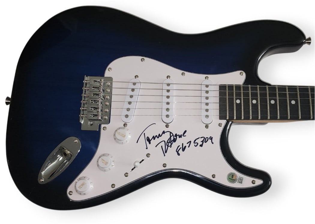 Tommy Tutone Autographed Electric Guitar with Beckett Authentication: Tommy Tutone Autographed Electric Guitar with Beckett Authentication This is an original signed electric guitar by Tommy Tutone, famously known for the hit song "Jenny Jenny (867-5309)." The guitar co