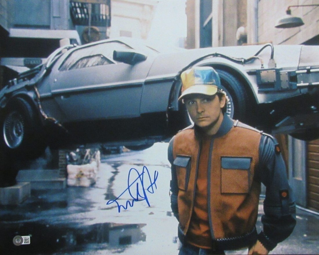Michael J Fox Signed Back to the Future II 16x20 Photo BAS Authenticated: Michael J Fox Signed Back to the Future II 16x20 Photo BAS Authenticated This is a hand-signed 16x20 inch photograph of Michael J. Fox from "Back to the Future II," authenticated by Beckett Authentica