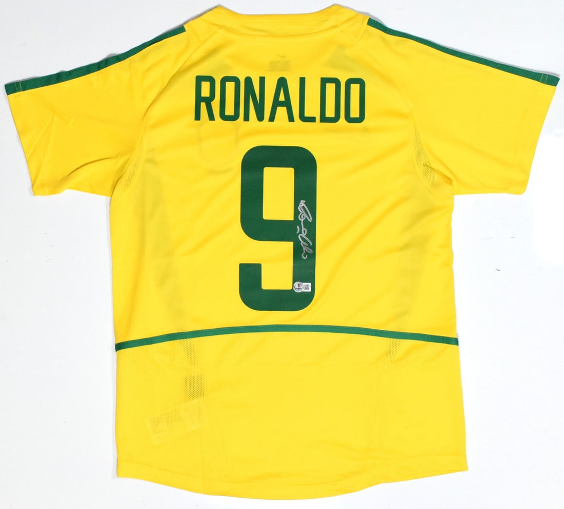 Ronaldo Signed Brazil Home Jersey #9 Beckett Holo: Ronaldo Signed Brazil Home Jersey #9 Beckett Holo This authentic Brazil home soccer jersey is a must-have for any fan of Ronaldo. The jersey is signed by the legendary player himself, showcasing his i