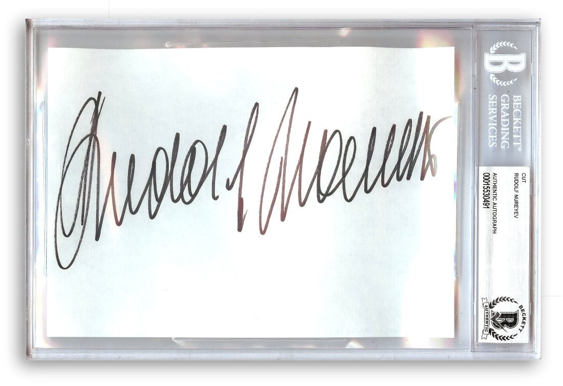 Autographed Rudolf Nureyev Album Page with Beckett Authentication Slab: Autographed Rudolf Nureyev Album Page with Beckett Authentication Slab This is an original album page autographed by renowned ballet dancer Rudolf Nureyev. The autograph is authenticated by Beckett Au