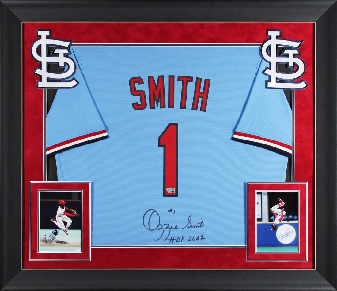 Ozzie Smith Signed Light Blue Nike Framed Jersey St. Louis Cardinals: Ozzie Smith Signed Light Blue Nike Framed Jersey St. Louis Cardinals Celebrate the legendary career of Ozzie Smith with this authentic autographed light blue Nike framed jersey. Personally signed by t