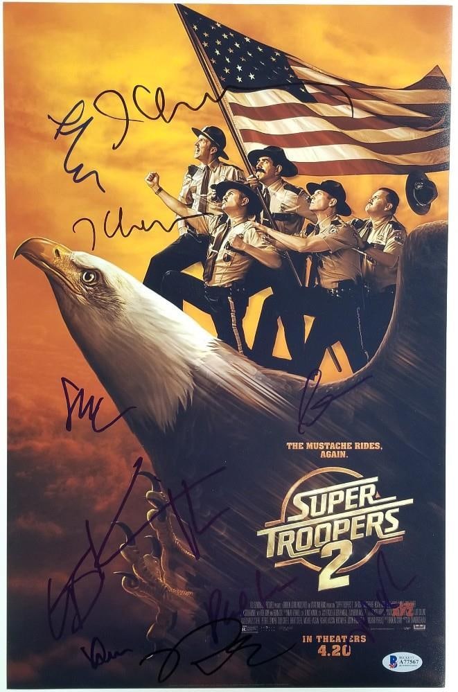 12x18 SUPER TROOPERS 2 Poster Signed by 10 Cast Members Beckett COA: 12x18 SUPER TROOPERS 2 Poster Signed by 10 Cast Members Beckett COA This is an original 12x18 inch movie poster from Super Troopers 2, signed by 10 cast members. The poster is an authentic collectible