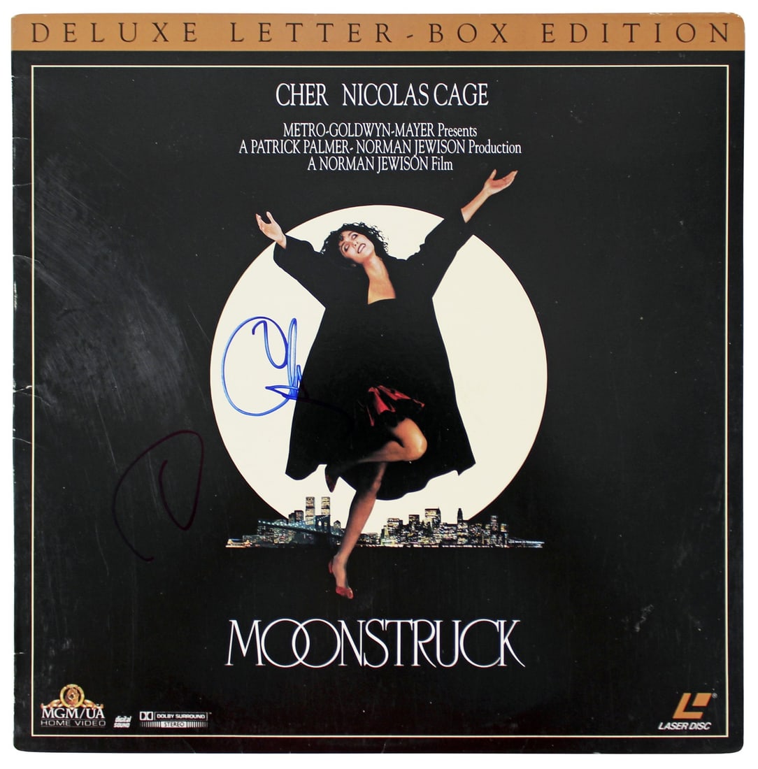 Cher Signed Moonstruck Soundtrack Laserdisc Cover BAS Authenticated: Cher Signed Moonstruck Soundtrack Laserdisc Cover BAS Authenticated This is an authentic, signed soundtrack laserdisc cover from the film "Moonstruck," personally signed by Cher. The signature appears