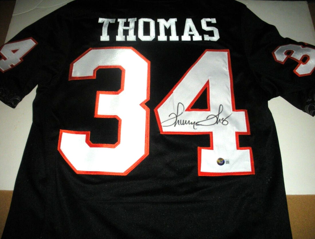 Thurman Thomas Oklahoma State Nike Jersey Beckett Certified: Thurman Thomas Oklahoma State Nike Jersey Beckett Certified This officially licensed Nike jersey, signed by Thurman Thomas, is a must-have for any Oklahoma State football fan. The jersey showcases the
