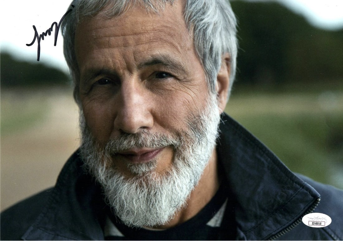 Cat Stevens Autographed 8x12 Photo JSA Certified: Cat Stevens Autographed 8x12 Photo JSA Certified This is an original 8x12 photograph of Cat Stevens, featuring a close-up of the artist with a beard. The photo is signed by Cat Stevens and has been au