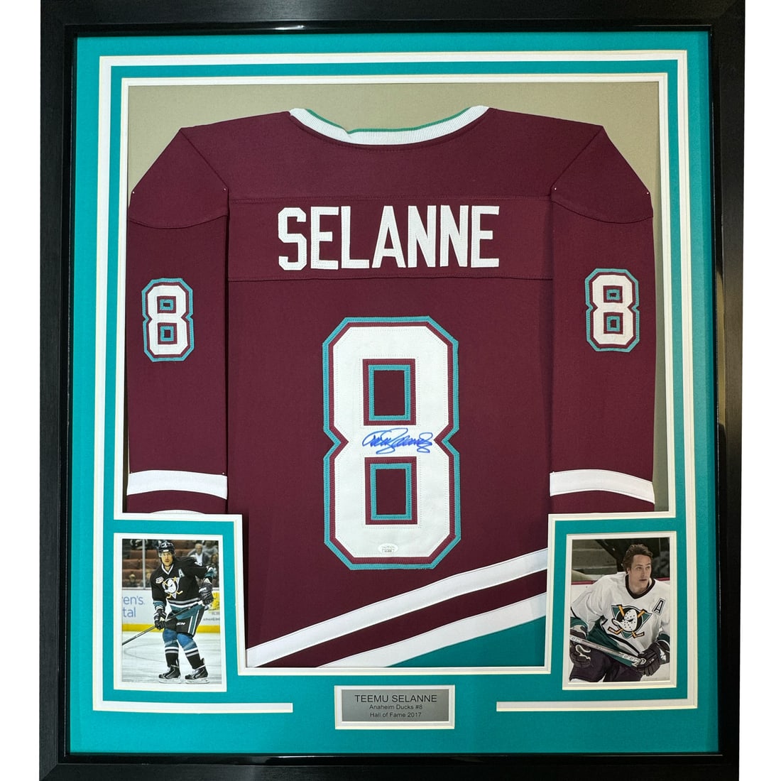 Framed Autographed Teemu Selanne Anaheim Ducks Jersey with JSA COA: Framed Autographed Teemu Selanne Anaheim Ducks Jersey with JSA COA Celebrate the legacy of Teemu Selanne with this stunning framed autographed Anaheim Ducks maroon jersey. Measuring an impressive 35x3