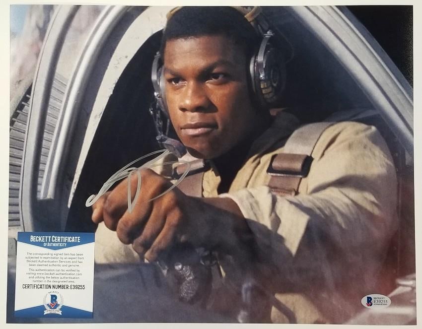 Star Wars Last Jedi 11x14 Photo Signed by John Boyega as Finn BAS COA: Star Wars Last Jedi 11x14 Photo Signed by John Boyega as Finn BAS COA This 11x14 photograph from Star Wars: The Last Jedi features the character Finn and is hand-signed by John Boyega. The autograph i