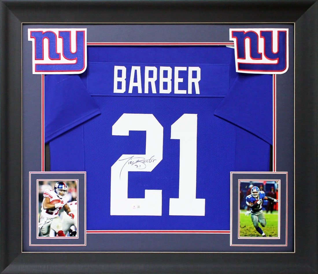 Tiki Barber Signed New York Giants Framed Jersey BAS Witnessed 32 x 37: Tiki Barber Signed New York Giants Framed Jersey BAS Witnessed 32 x 37 Celebrate your favorite player with this authentic, signed blue pro-style jersey of Tiki Barber from the New York Giants. This or