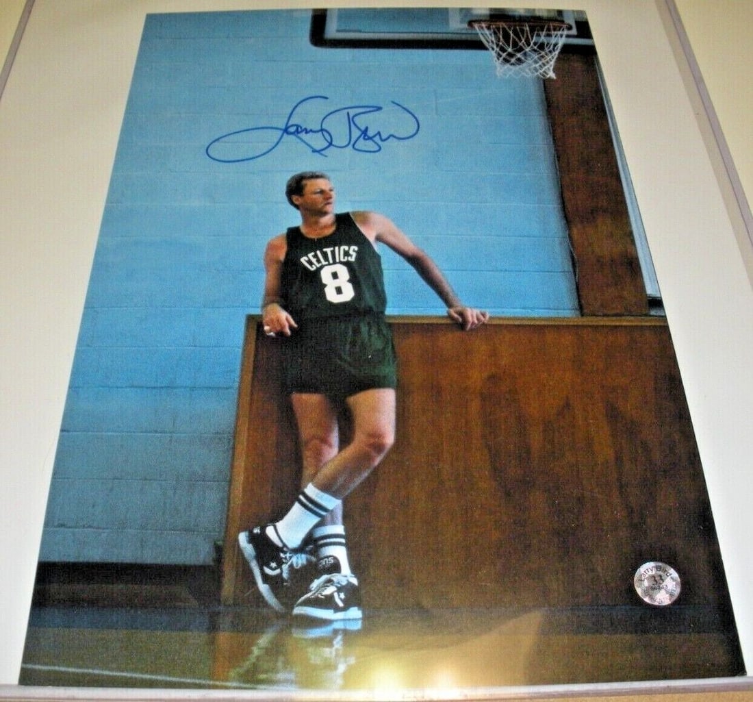 Larry Bird Signed 11x14 Boston Celtics Photo With Hologram Authentication: Larry Bird Signed 11x14 Boston Celtics Photo With Hologram Authentication This is an original 11x14 photograph featuring Larry Bird of the Boston Celtics. The photo is signed by Larry Bird and include