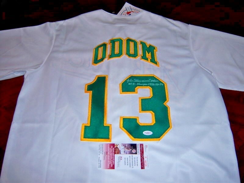 Majestic Baseball Jersey Signed by John Blue Moon Odom with JSA COA: Majestic Baseball Jersey Signed by John Blue Moon Odom with JSA COA This is an official licensed Majestic jersey signed by John "Blue Moon" Odom of the Athletics. The jersey is original, not a reprint