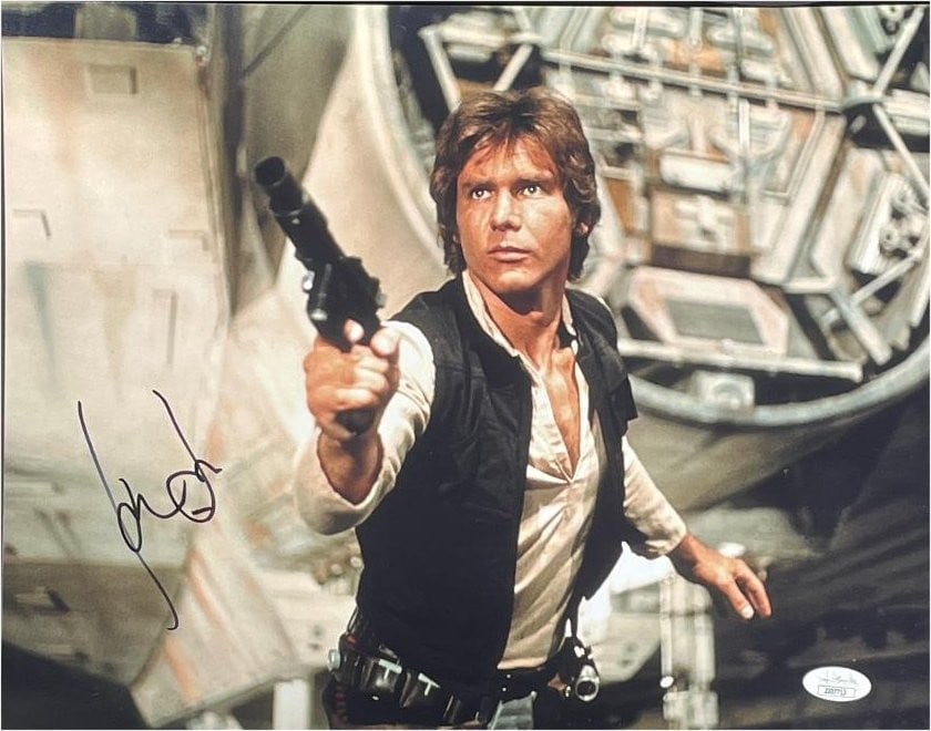 Harrison Ford Signed 11x14 Star Wars Photo JSA Authenticated: Harrison Ford Signed 11x14 Star Wars Photo JSA Authenticated This impressive 11x14 photograph features the iconic Harrison Ford, known for his legendary role in Star Wars. The photo is authentically s