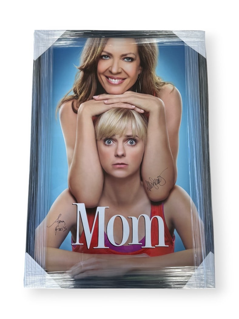 Framed Mom 28x40 Poster Signed by Anna Faris and Allison Janney JSA Authenticated: Framed Mom 28x40 Poster Signed by Anna Faris and Allison Janney JSA Authenticated This framed poster features authentic autographs from Anna Faris and Allison Janney, stars of the television show 'Mom
