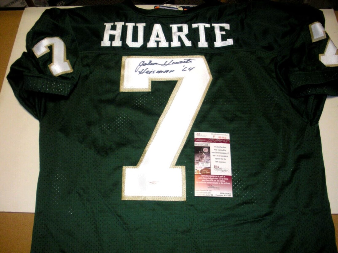 John Huarte Notre Dame Signed Reebok Jersey with JSA COA: John Huarte Notre Dame Signed Reebok Jersey with JSA COA This official licensed Reebok jersey, signed by John Huarte, showcases a unique piece of Notre Dame football history. With a focus on collectib