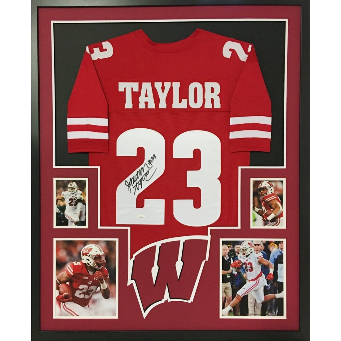 Wisconsin Badgers Jonathan Taylor JSA Authenticated Autographed Framed Jersey: Wisconsin Badgers Jonathan Taylor JSA Authenticated Autographed Framed Jersey This framed jersey features an authentic Jonathan Taylor autograph and represents the Wisconsin Badgers. The jersey has