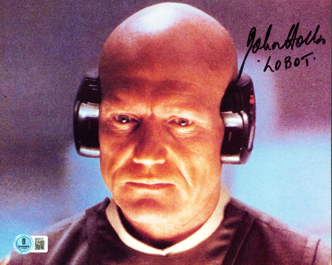 John Hollis Signed Lobot Photo Star Wars BAS Authenticated 8x10: John Hollis Signed Lobot Photo Star Wars BAS Authenticated 8x10 This stunning horizontal 8x10 photograph features John Hollis, known for his role as "Lobot" in Star Wars: The Empire Strikes Back. The