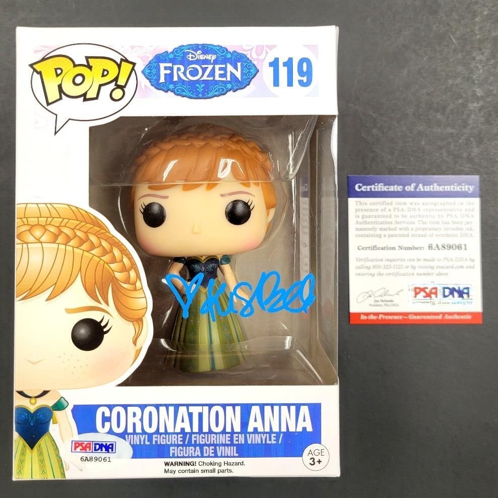 Kristen Bell Signed Funko Pop Coronation Anna with PSA/DNA COA: Kristen Bell Signed Funko Pop Coronation Anna with PSA/DNA COA Celebrate your love for Disney's Frozen with this original Funko Pop figure of Coronation Anna, personally signed by Kristen Bell. This c