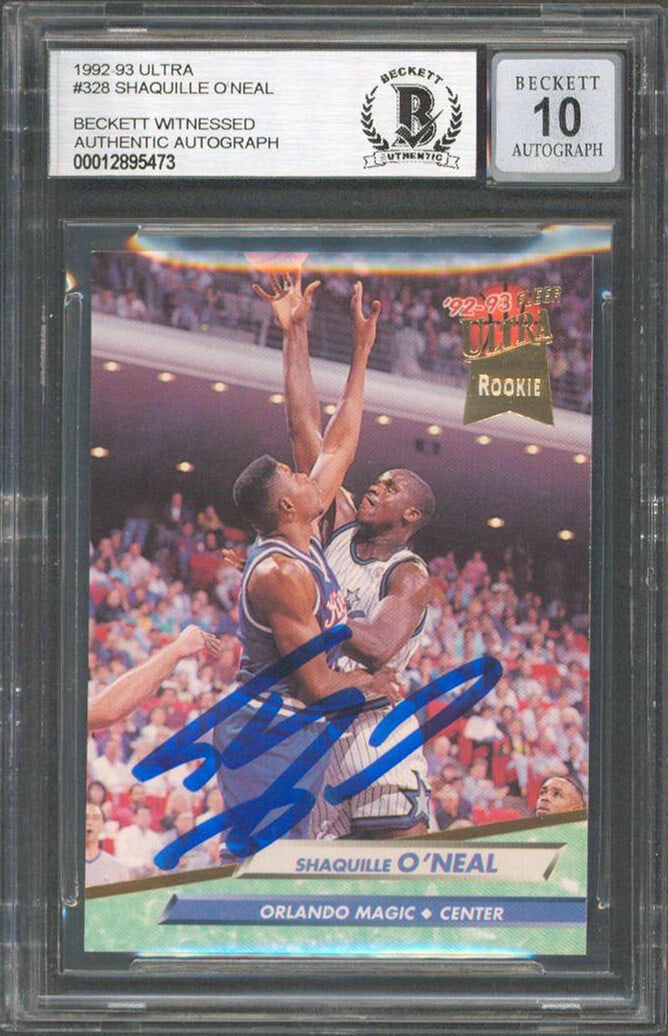 Shaquille O'Neal Signed 1992 Ultra Rookie Card Gem Mint 10 BAS Slab: Shaquille O'Neal Signed 1992 Ultra Rookie Card Gem Mint 10 BAS Slab This 1992 Ultra #328 Rookie Card is a remarkable collectible featuring the legendary Shaquille O'Neal, personally signed and graded
