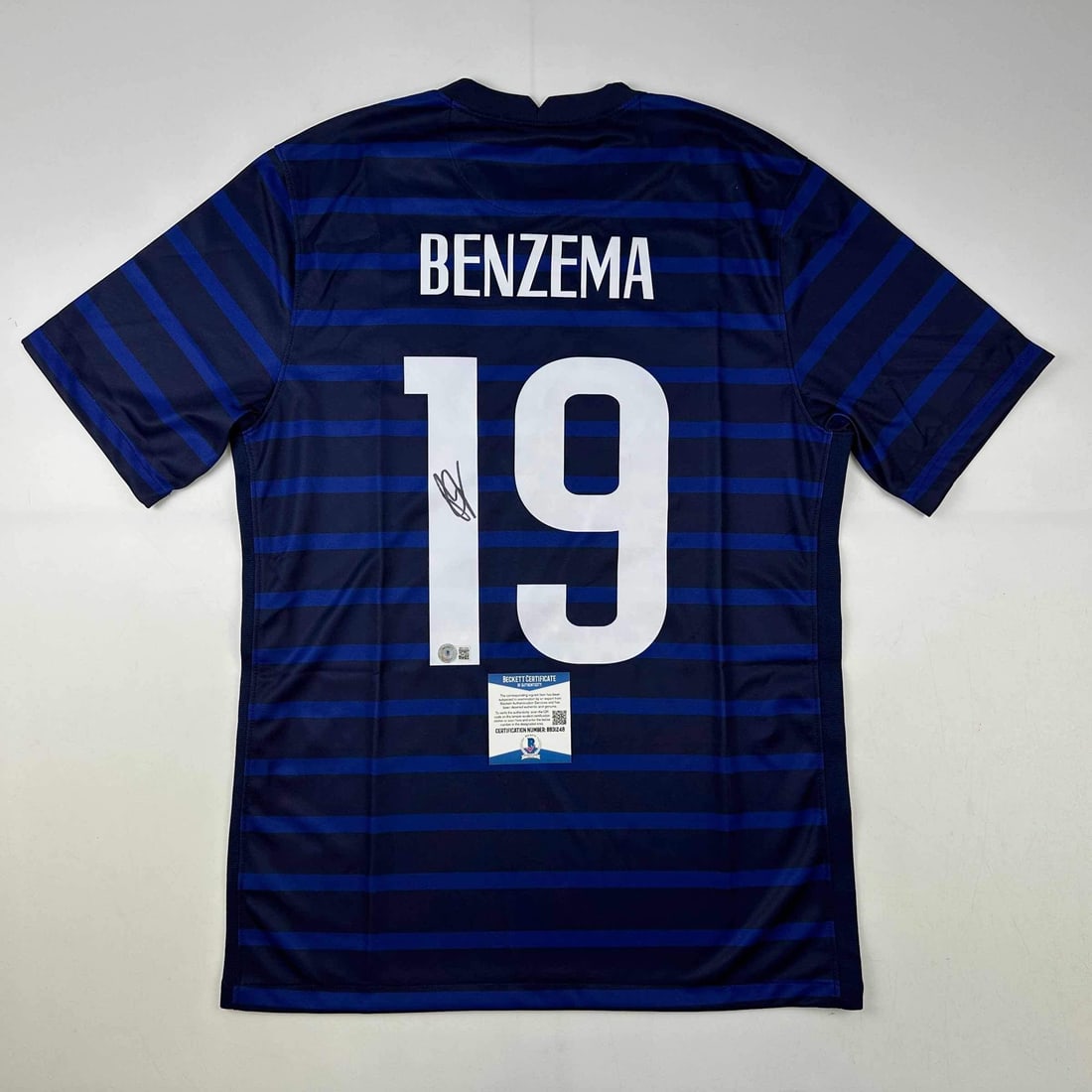 Karim Benzema Signed France Jersey Beckett Authenticated World Cup Collectible: Karim Benzema Signed France Jersey Beckett Authenticated World Cup Collectible This is an autographed custom jersey of Karim Benzema, featuring the name and number of the player, designed for collecto