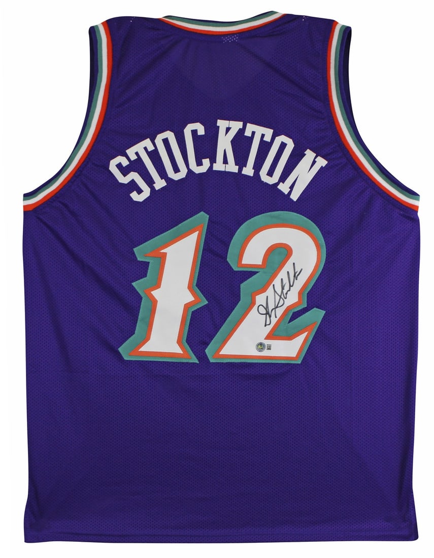 John Stockton Signed Utah Jazz Purple Pro Jersey BAS Authenticated: John Stockton Signed Utah Jazz Purple Pro Jersey BAS Authenticated This authentic autographed purple pro style jersey features the signature of John Stockton, a legendary player of the Utah Jazz. Each