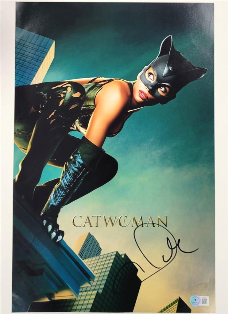 Halle Berry autographed Catwoman photograph with Beckett authentication 11x17: Halle Berry autographed Catwoman photograph with Beckett authentication 11x17 This is an original 11x17 photograph from Catwoman, personally signed by Halle Berry. The autograph has been authenticated