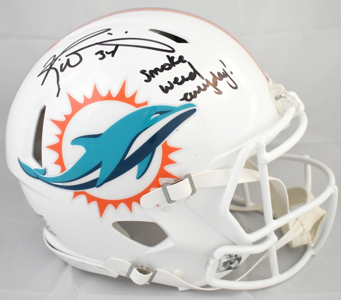 Miami Dolphins Full Size Speed Authentic Helmet Signed by Ricky Williams Beckett Holo: Miami Dolphins Full Size Speed Authentic Helmet Signed by Ricky Williams Beckett Holo This is an original Miami Dolphins full-size Speed Authentic helmet, signed by Ricky Williams. The helmet is authe