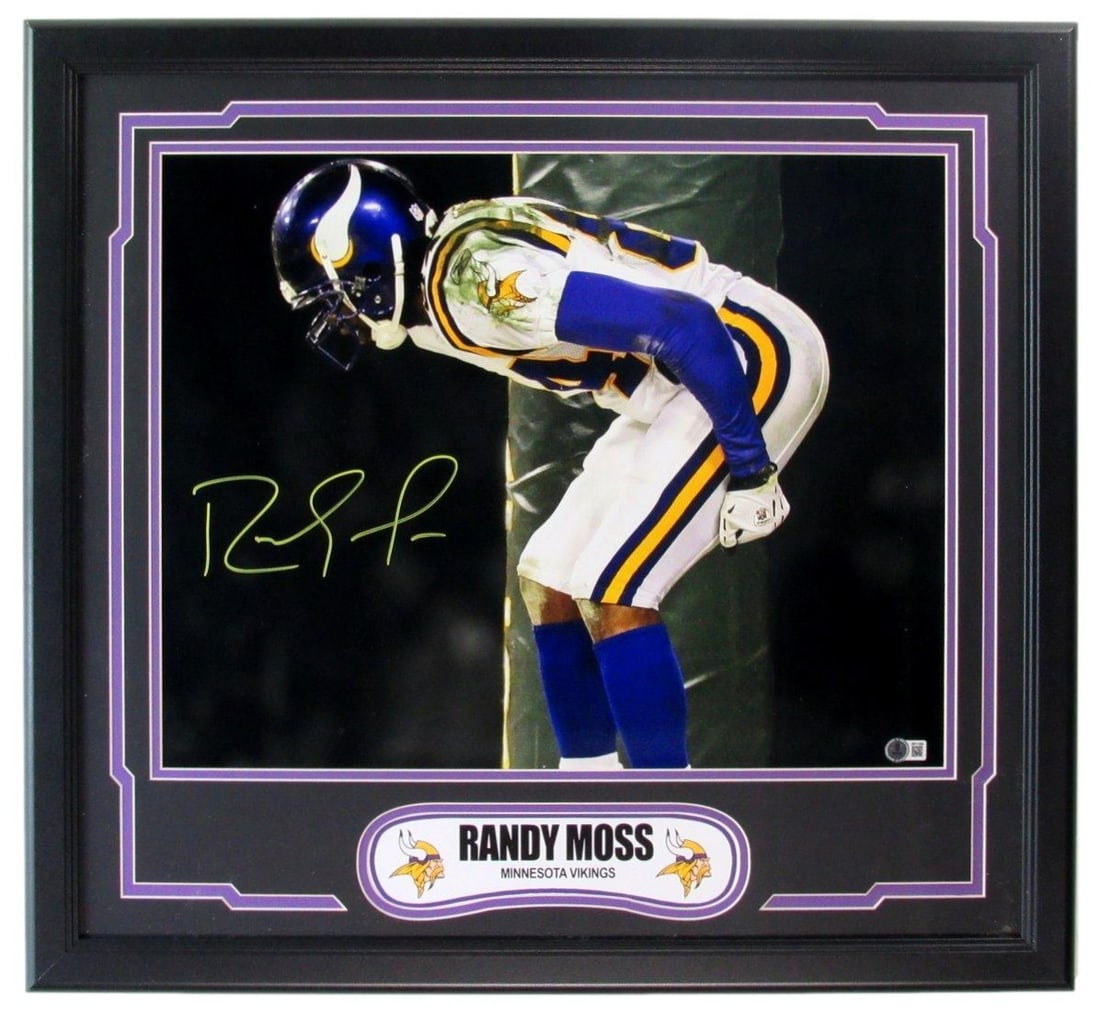 Framed 16x20 Vikings Photo Signed by Randy Moss with Beckett Authentication: Framed 16x20 Vikings Photo Signed by Randy Moss with Beckett Authentication This framed 16x20 photograph features the authentic signature of Randy Moss, the Hall of Fame wide receiver for the Minnesot
