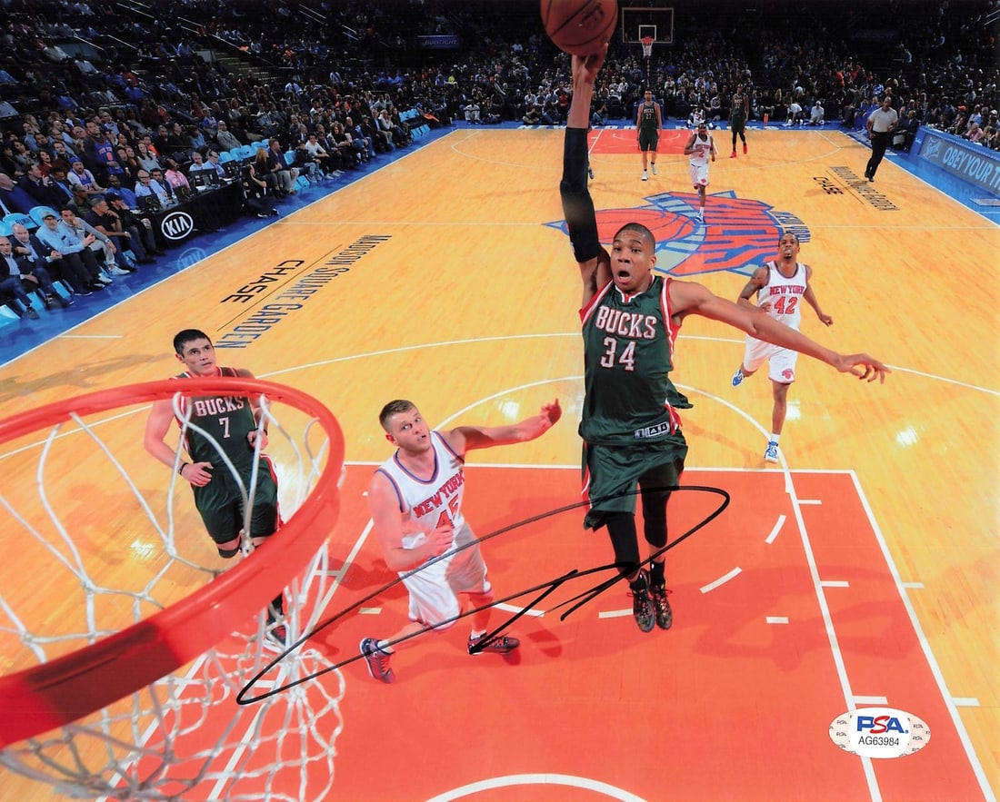 Giannis Antetokounmpo Autographed 8x10 Photo PSA/DNA Milwaukee Bucks: Giannis Antetokounmpo Autographed 8x10 Photo PSA/DNA Milwaukee Bucks This is a professionally printed 8x10 photograph signed by Giannis Antetokounmpo, star player of the Milwaukee Bucks. The autograph