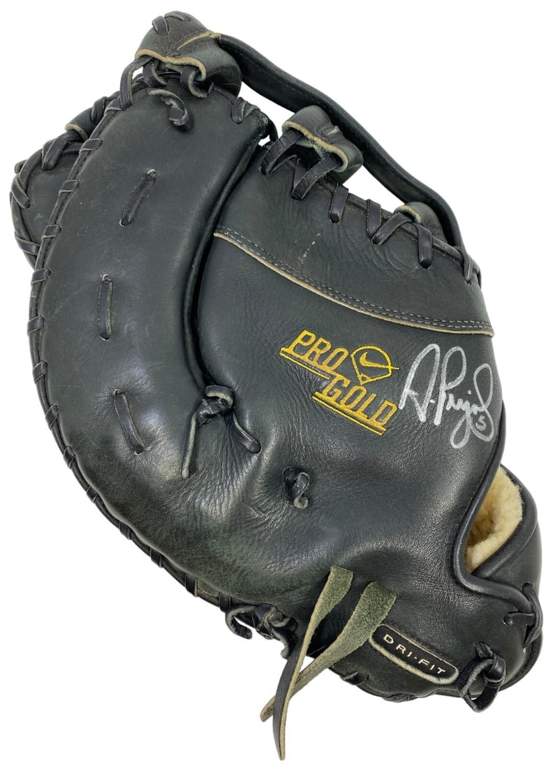 Albert Pujols 2001 Rookie Game Used Signed Nike Baseball Glove PSA/DNA: Albert Pujols 2001 Rookie Game Used Signed Nike Baseball Glove PSA/DNA Celebrate the legacy of baseball superstar Albert Pujols with this authentic game-used signed glove from his rookie year. This Ni