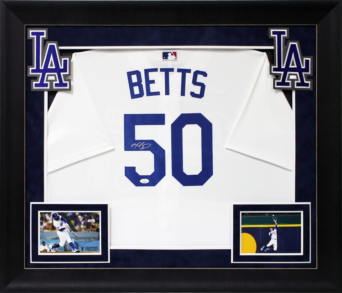 Mookie Betts Signed Framed Dodgers Jersey JSA Authenticated 32 x 37 Inches: Mookie Betts Signed Framed Dodgers Jersey JSA Authenticated 32 x 37 Inches This is a framed white Majestic Cool Base jersey personally signed by Mookie Betts of the Los Angeles Dodgers. The jersey fea