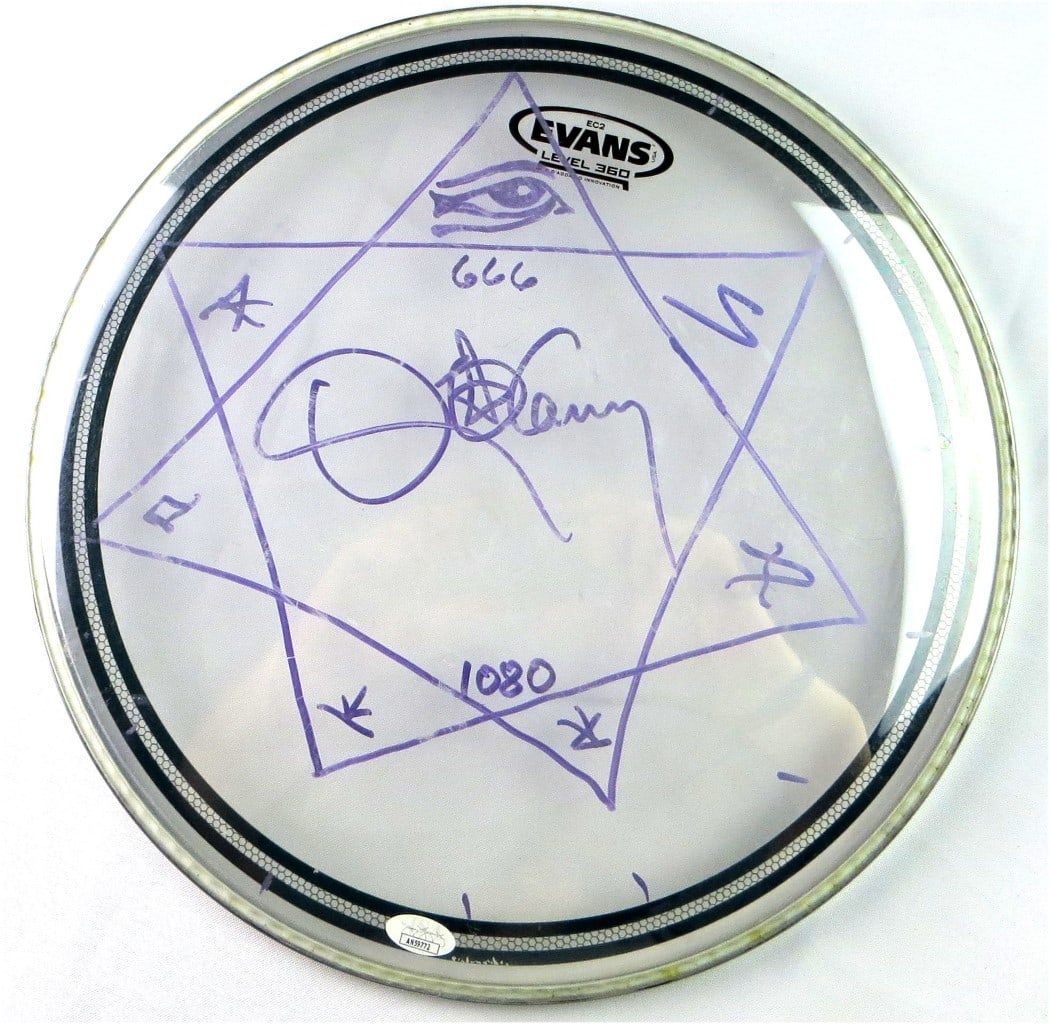 Danny Carey Signed 14 Drumhead with Pentagram Sketch JSA Authenticated: Danny Carey Signed 14 Drumhead with Pentagram Sketch JSA Authenticated This authentic 14" drumhead features the signature of Danny Carey, the renowned drummer of the band Tool. The drumhead is an orig