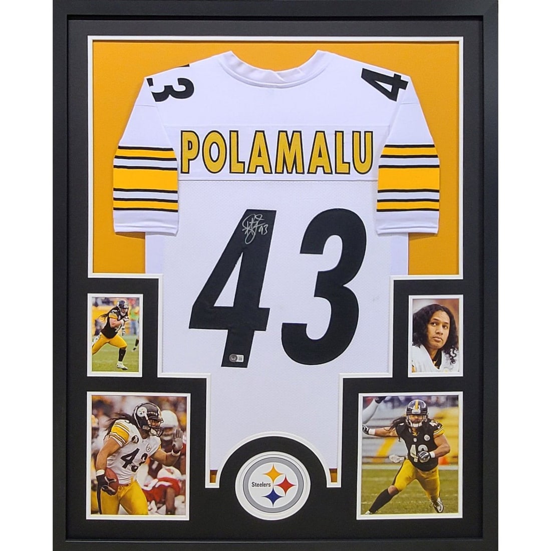 Framed Pittsburgh Steelers Jersey Autographed by Troy Polamalu Beckett Authenticated: Framed Pittsburgh Steelers Jersey Autographed by Troy Polamalu Beckett Authenticated This is a framed Pittsburgh Steelers jersey autographed by Troy Polamalu. The signature is authenticated by Beckett