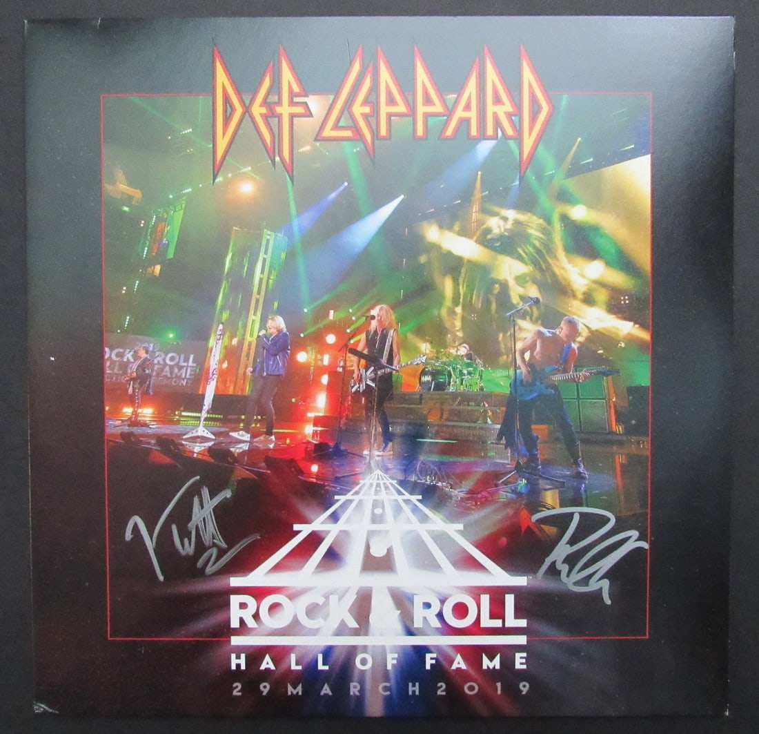 Def Leppard Dual-Signed Album Hall of Fame JSA Authenticated: Def Leppard Dual-Signed Album Hall of Fame JSA Authenticated This is an original Def Leppard album titled "Hall of Fame," dual-signed by band members Joe Elliott and Phil Collen. The album comes with