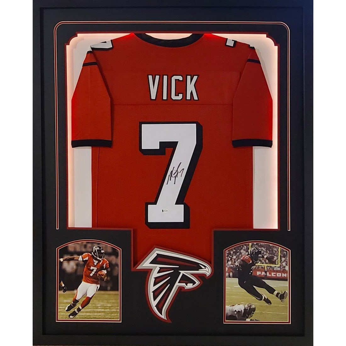 LED Display Atlanta Falcons Jersey Signed by Michael Vick Beckett Authenticated: LED Display Atlanta Falcons Jersey Signed by Michael Vick Beckett Authenticated This Michael Vick LED framed jersey is autographed and authenticated by Beckett, featuring a Beckett tamper-proof sticke